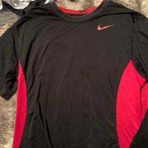Red and black breathable athletic shirt.